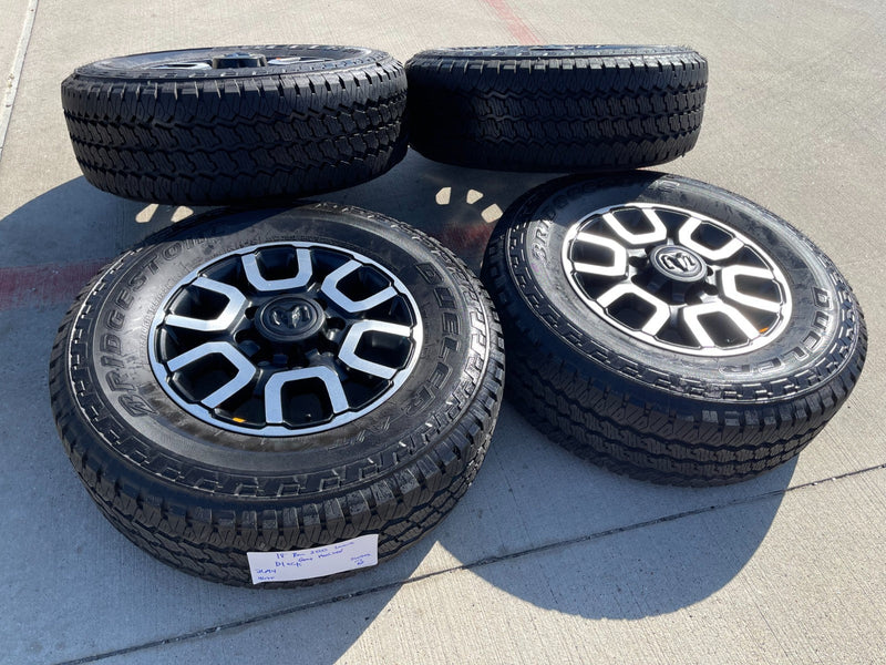 18" Ram 2500 3500 LARAMIE OEM wheels rims 2694 tires BRIDGESTONE A/T NEW 2026 Texas Truck Tire