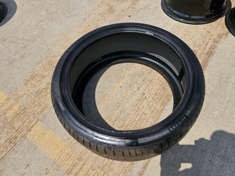 (1) 265/35/21 Pirelli P Zero tire Elect LM1 NEW take off! Texas Truck Tire