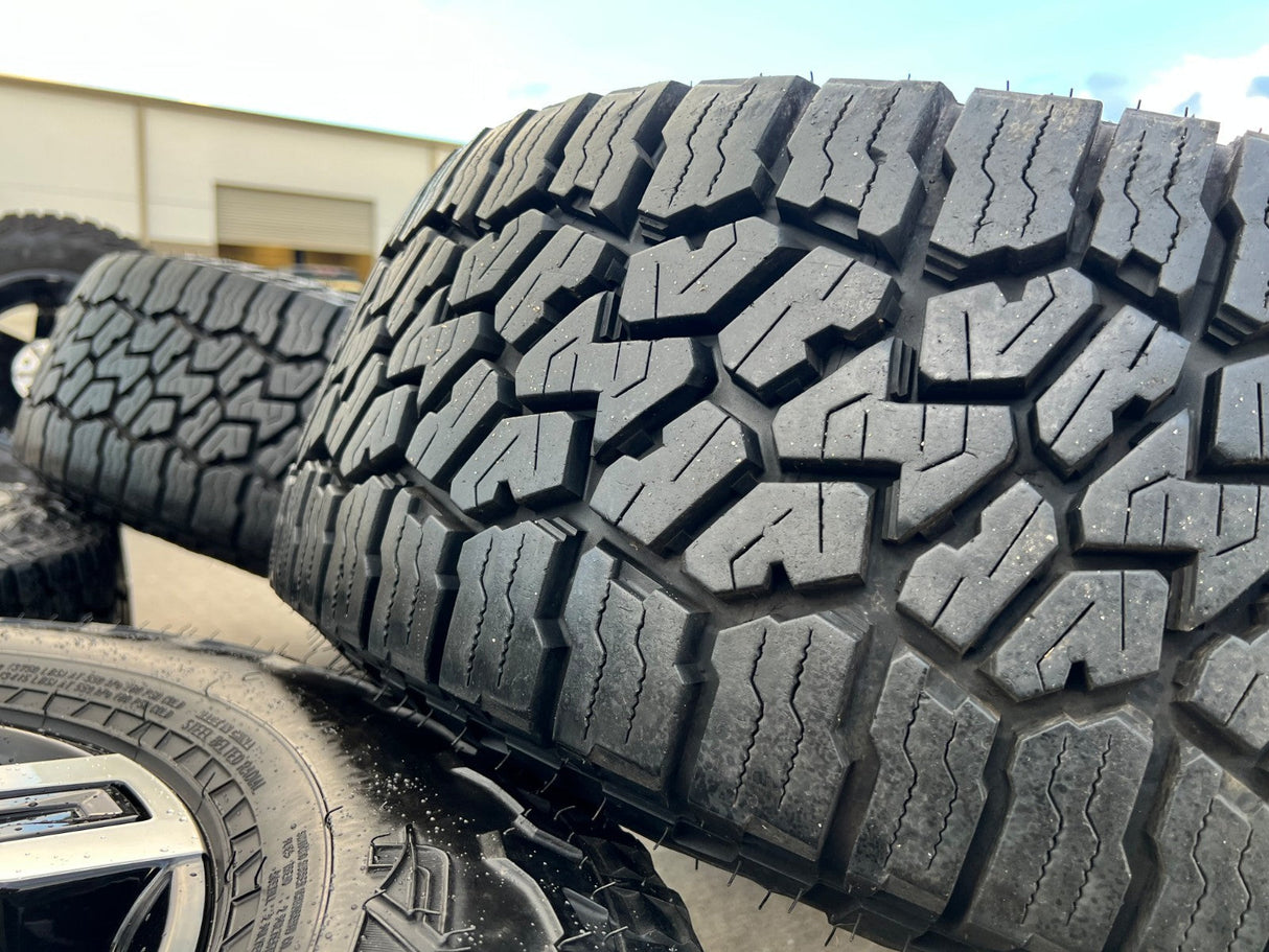 20" GMC Sierra AT4X 2500 3500 OEM wheels rims 5958 14138 Chevy Silverado FALKEN Texas Truck Tire