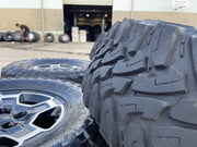 17" Jeep Wrangler RUBICON OEM wheels rims tires 9259 black TOYO 33" Texas Truck Tire