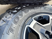 17" Jeep Wrangler RUBICON OEM wheels rims tires 9259 black TOYO 33" Texas Truck Tire