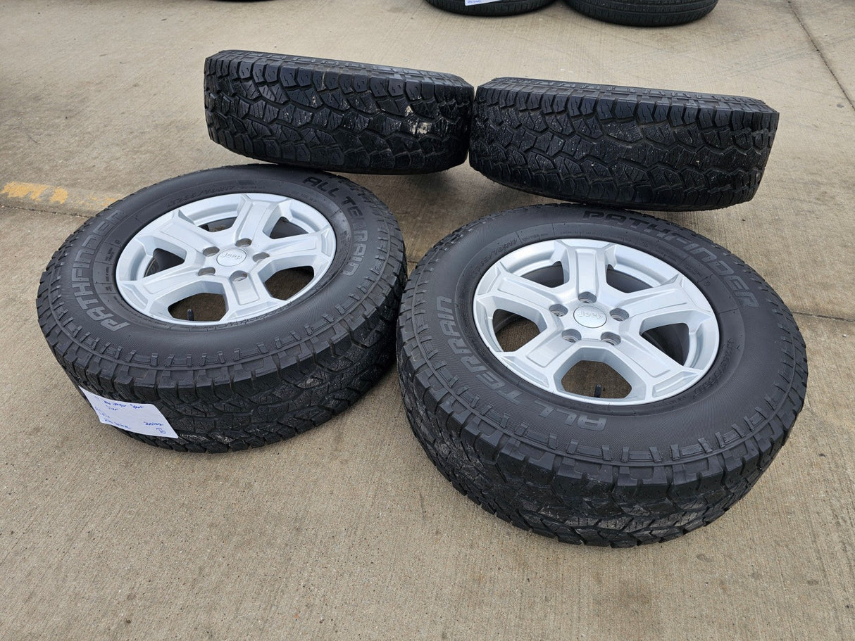 17" Jeep Wrangler Rubicon OEM wheels rims 9216 Gladiator tires A/T Texas Truck Tire