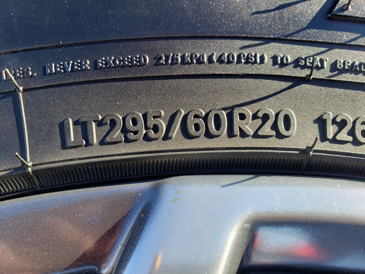 20" GMC Sierra Yukon AT4 Tahoe Silverado OEM 95369 wheels rims TOYO 34" Texas Truck Tire
