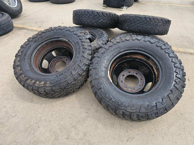 17" Dodge Ram 3500 Dually Laramie 8x200 wheels rims 2703 2704 OEM TOYO M/T 33" Texas Truck Tire