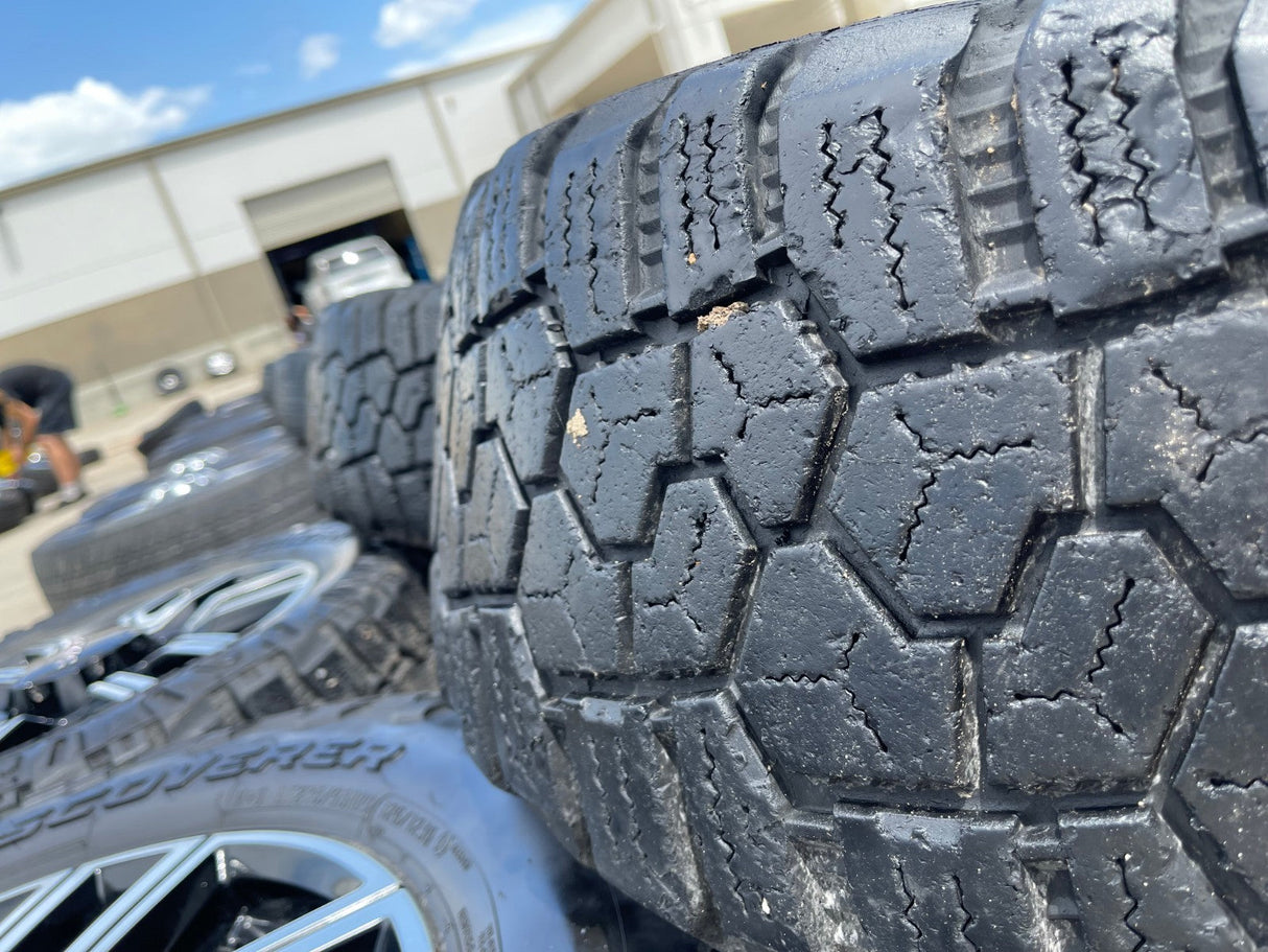 20" GMC Sierra AT4 2500 3500 OEM wheels rims 5950 Silverado COOPER RUGGED TREK Texas Truck Tire