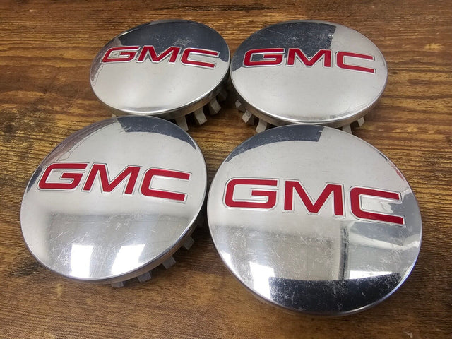 (4) 3.25" GMC Sierra 1500 Yukon XL Suburban OEM center caps C5650 83MM Texas Truck Tire