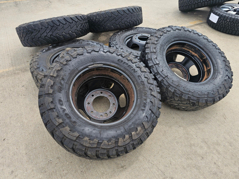 17" Dodge Ram 3500 Dually Laramie 8x200 wheels rims 2703 2704 OEM TOYO M/T 33" Texas Truck Tire