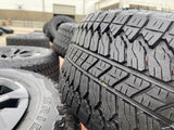 20" Chevy Tahoe Silverado OEM 14090 95417 wheels rims tires BRIDGESTONE A/T NEW Texas Truck Tire