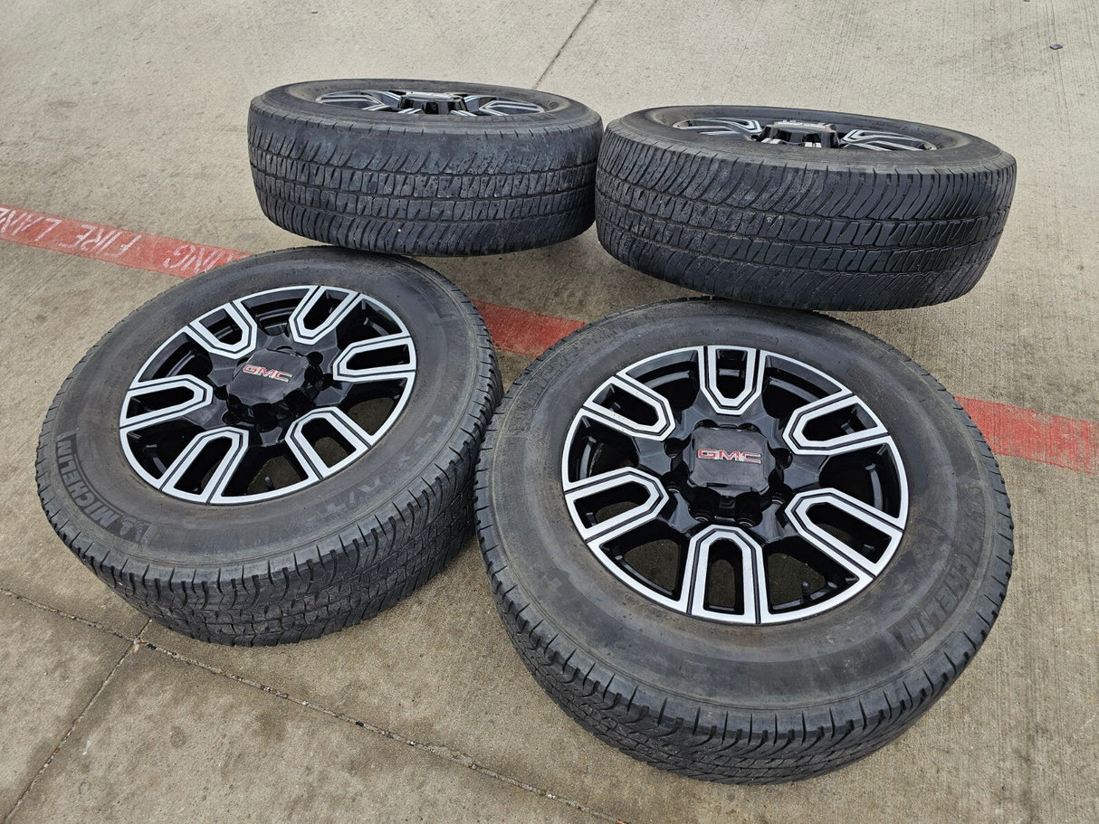 20" GMC Sierra AT4 2500 3500 OEM wheels rims 5950 Silverado MICHELIN Texas Truck Tire