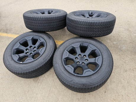 20" Dodge Ram 1500 OEM Laramie Black 2680 wheels rims 2024 2025 2026 BRIDGESTONE Texas Truck Tire