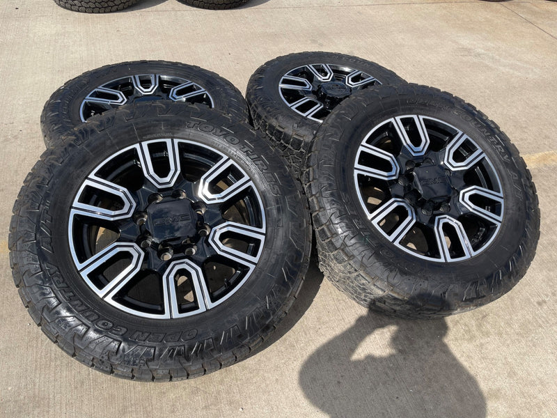 20" GMC Sierra AT4 2500 3500 OEM wheels rims 5950 Silverado tires TOYO A/T3 Texas Truck Tire