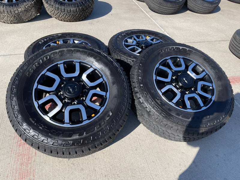 18" Ram 2500 3500 LARAMIE OEM wheels rims 2694 tires BRIDGESTONE A/T NEW 2026 Texas Truck Tire