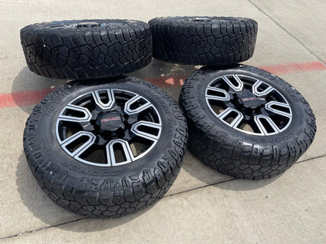20" GMC Sierra AT4 2500 3500 OEM wheels rims 5950 Silverado COOPER RUGGED TREK Texas Truck Tire