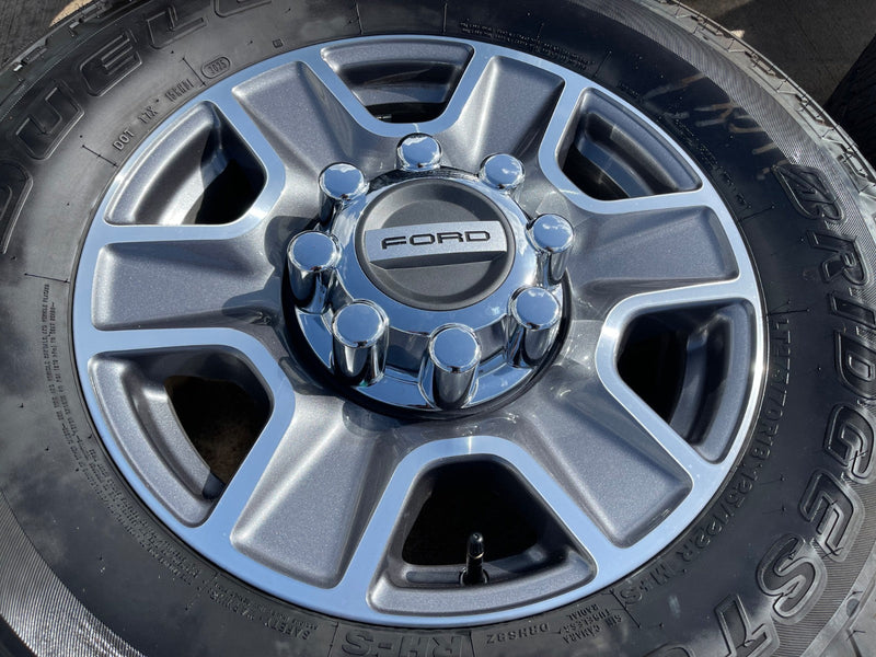18" Ford F-250 F-350 Lariat FX-4 OEM wheels 10480 10298 tires BRIDGESTONE A/T Texas Truck Tire
