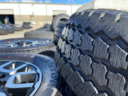 18" Ram 2500 3500 LARAMIE OEM wheels rims 2694 tires BRIDGESTONE A/T NEW 2026 Texas Truck Tire