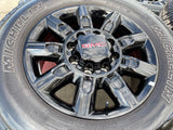 20" GMC Sierra AT4X 2500 3500 OEM 14137 5963 wheels rims Silverado MICHELIN Texas Truck Tire
