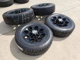 20" Ford F-250 F-350 OEM black TREMOR wheels rims 10299 10484 A/T2 tires NEW Texas Truck Tire