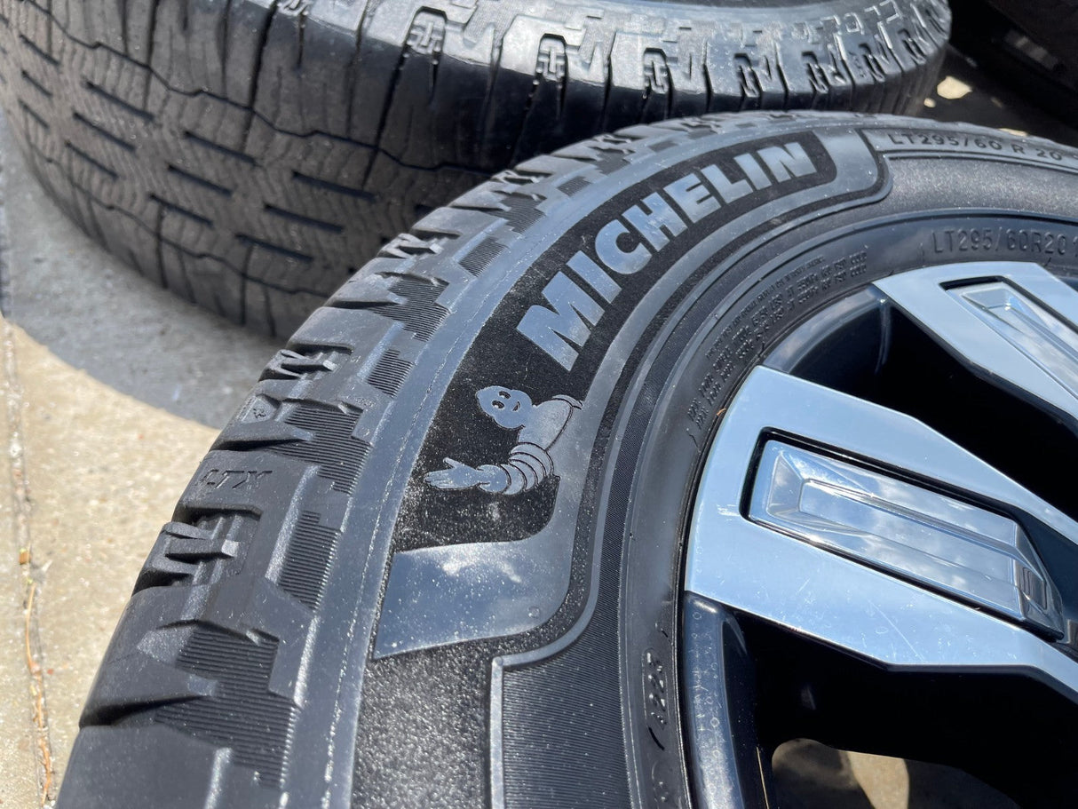 20" GMC Sierra 2500 3500 OEM wheels rims 5958 14138 tires MICHELIN DEFENDER Texas Truck Tire