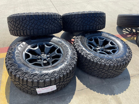18" Dodge Ram 1500 TRX RHO Black OEM 66002 wheels rims TERRITORY M/T 35" Texas Truck Tire
