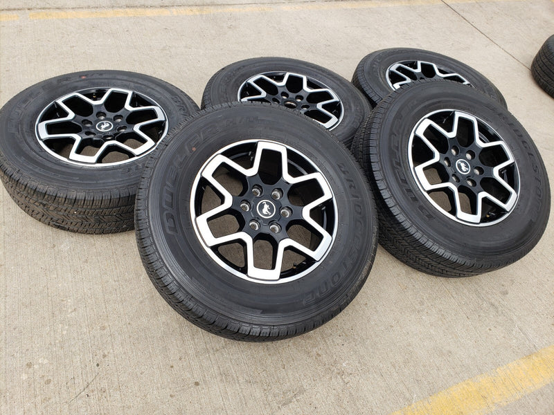 18" Ford Bronco wheels rims tires black 95213 Ranger tires BRIDGESTONE DUELER HT Texas Truck Tire