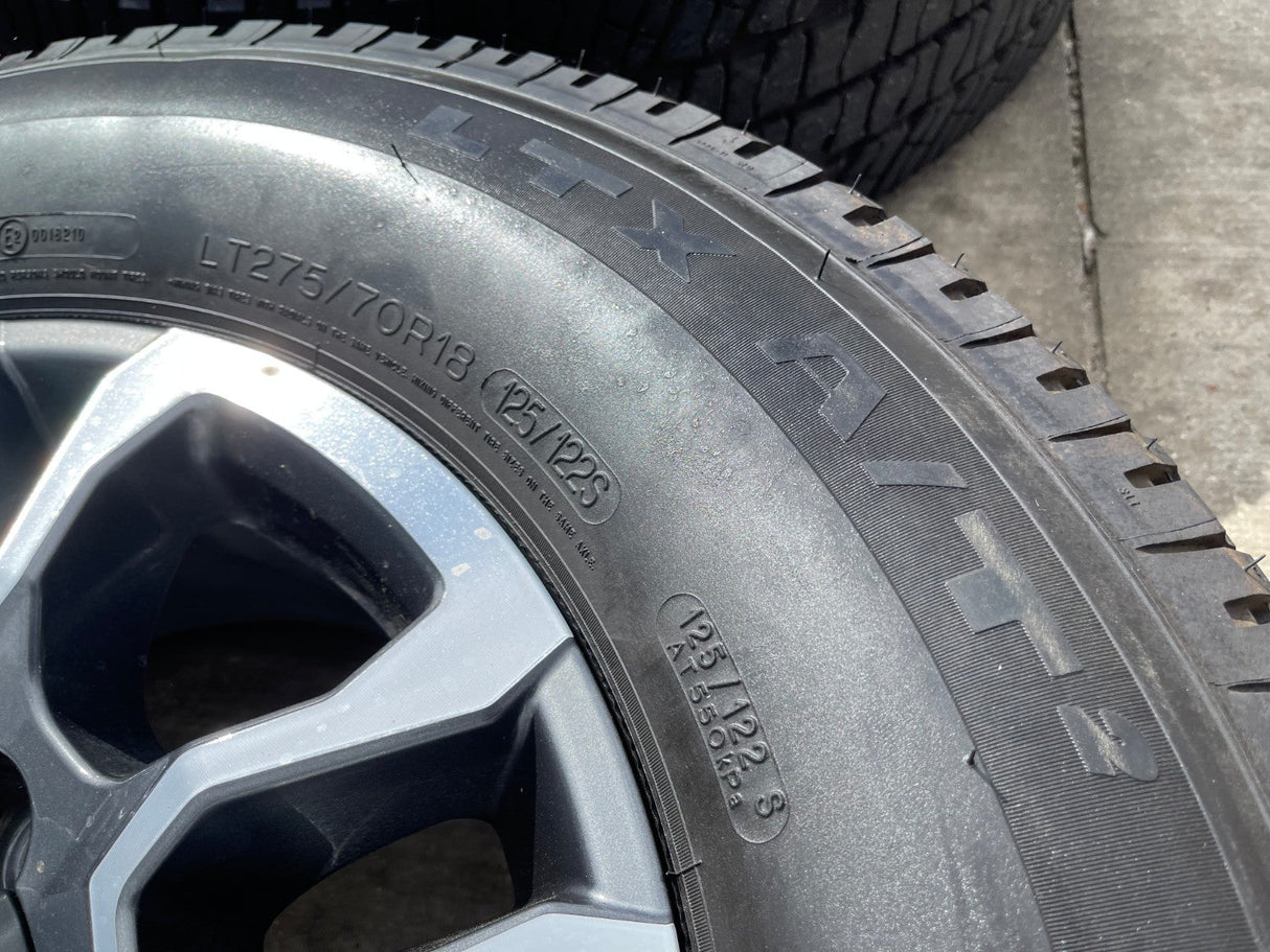 18" GMC Sierra AT4X Chevy Silverado 2500 3500 OEM 5949 wheels rims MICHELIN NEW Texas Truck Tire