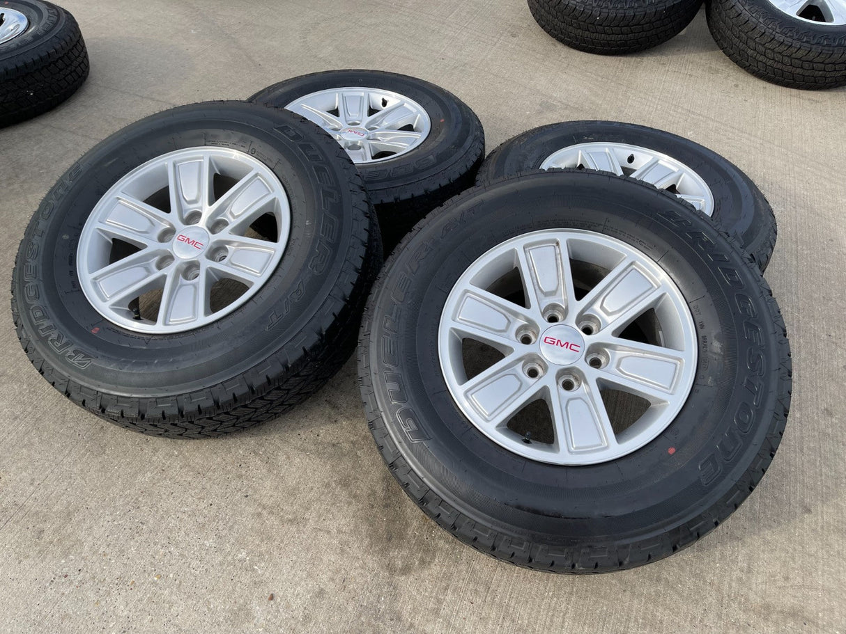 17" GMC Sierra Yukon Chevy Silverado Tahoe OEM 5654 wheels rims BRIDGESTONE A/T Texas Truck Tire