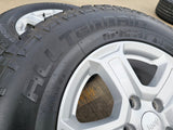 17" Jeep Wrangler Rubicon OEM wheels rims 9216 Gladiator tires A/T Texas Truck Tire