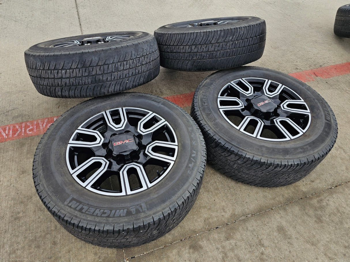 20" GMC Sierra AT4 2500 3500 OEM wheels rims 5950 Silverado MICHELIN Texas Truck Tire