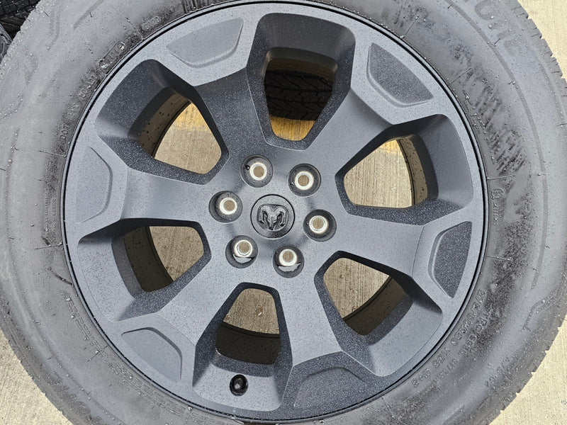 20" Dodge Ram 1500 OEM Laramie Black 2680 wheels rims 2024 2025 2026 BRIDGESTONE Texas Truck Tire