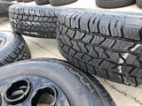 20" Ford F-250 F-350 OEM black TREMOR wheels rims 10299 10484 A/T2 tires NEW Texas Truck Tire