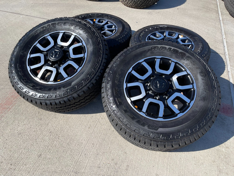 18" Ram 2500 3500 LARAMIE OEM wheels rims 2694 tires BRIDGESTONE A/T NEW 2026 Texas Truck Tire