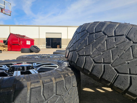 20" GMC Sierra AT4 2500 3500 OEM wheels rims 5950 Silverado NITRO 35" Texas Truck Tire