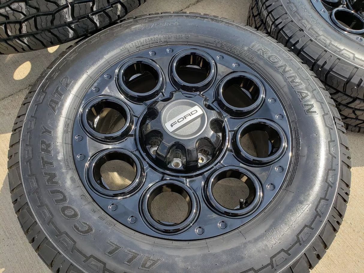 20" Ford F-250 F-350 OEM black TREMOR wheels rims 10299 10484 A/T2 tires NEW Texas Truck Tire