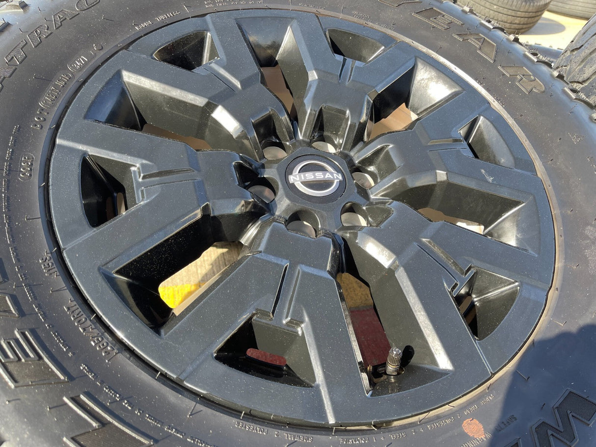 17" Nissan Frontier OEM Desert Runner 62832 wheels rims tires DURATRAC A/T Texas Truck Tire