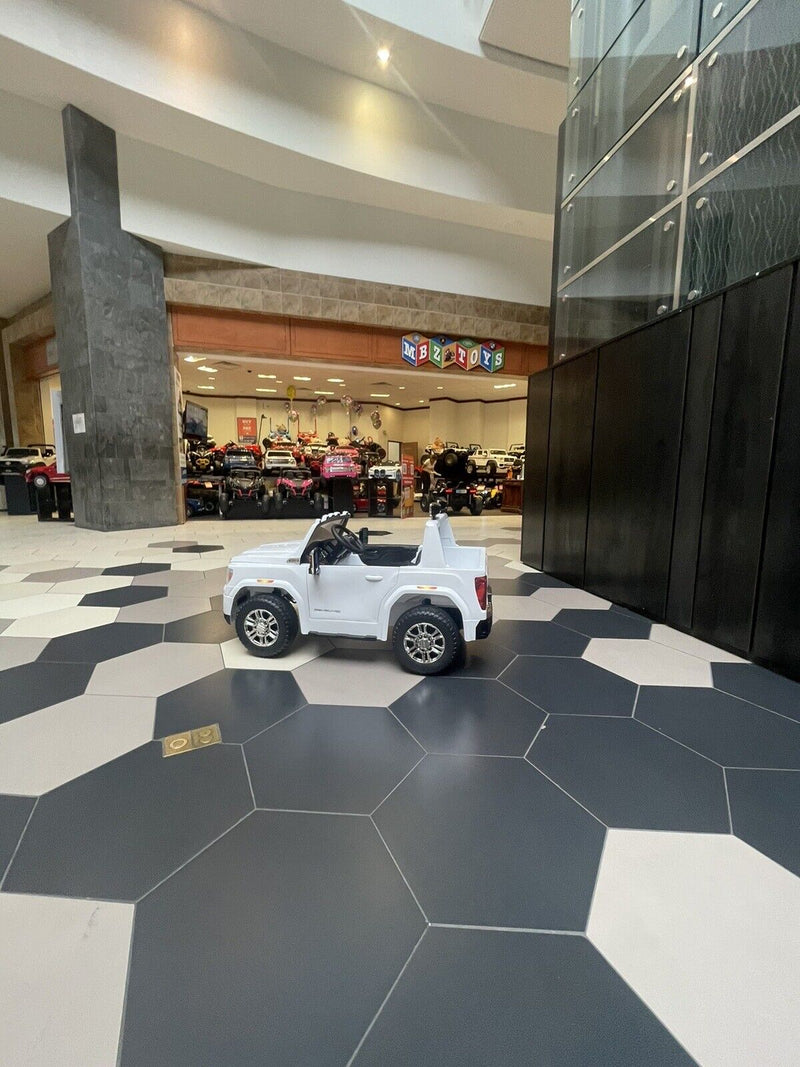 24V Interactive TV GMC Ride On Electric Toy 4x4 with Leather Seating and Advanced Rubber EVA Tires - Remote Control