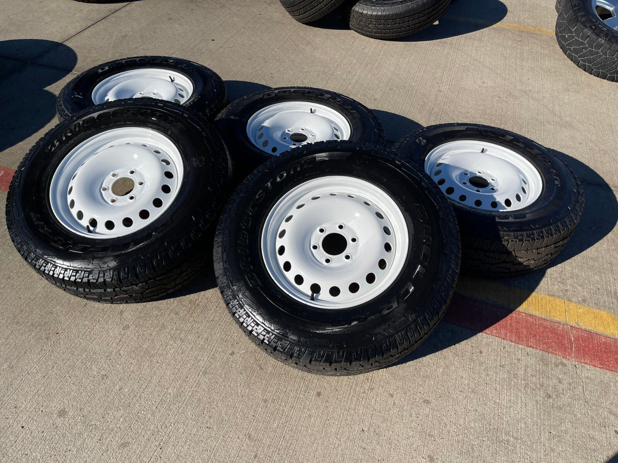 (4) 17" INEOS Grenadier OEM steel wheels rims WHITE tires 2024 2025 2026 NEW Texas Truck Tire