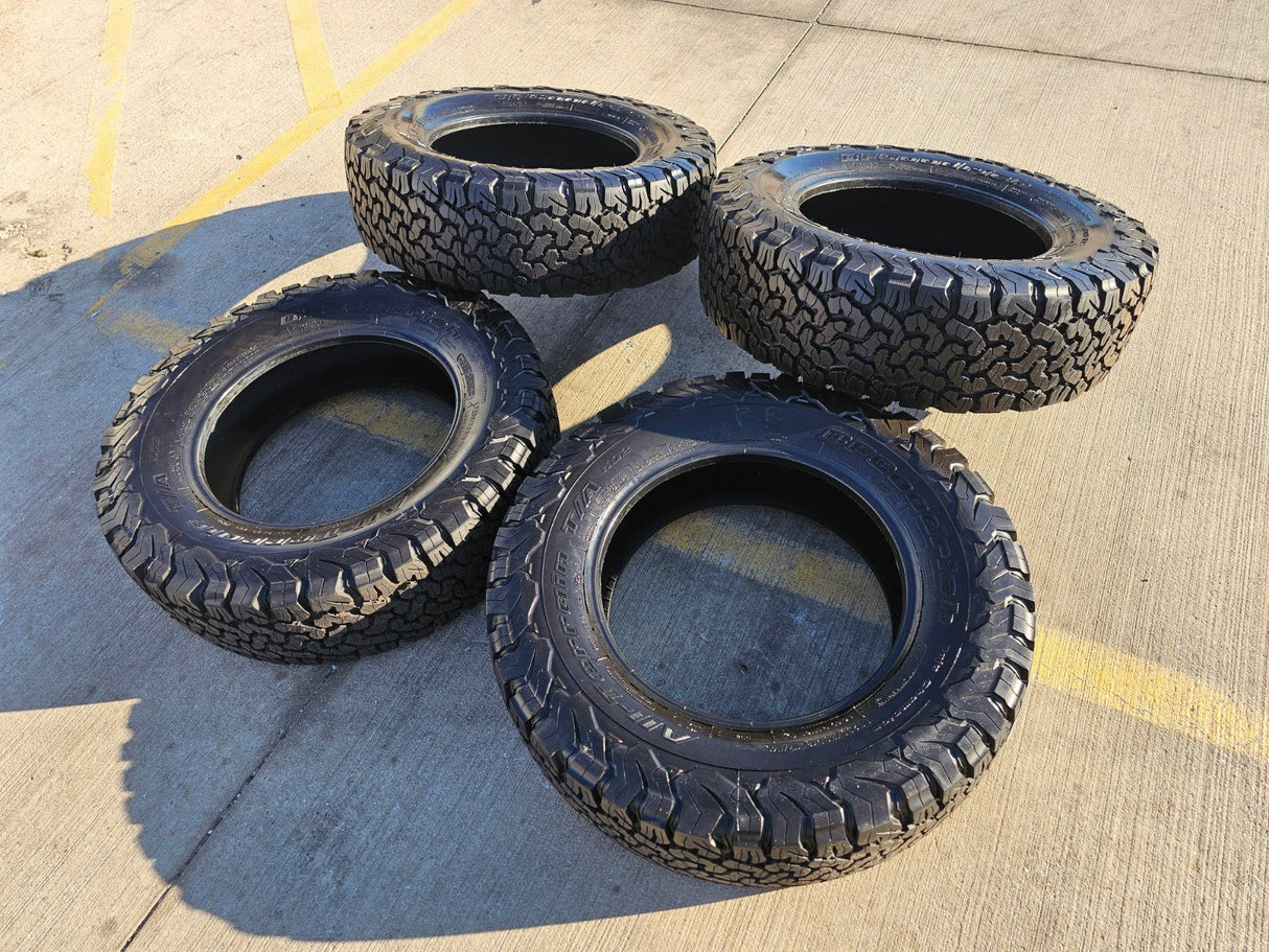 (4) 255/70/18 BFG KO2 A/T tires F-150 Sierra Tahoe Silverado NEW TAKE OFFS NEW Texas Truck Tire