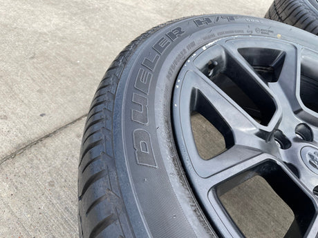 22" Dodge Ram 1500 OEM LIMITED Laramie wheels rims black 2725 2684 BRIDGESTONE Texas Truck Tire