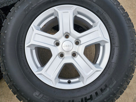 17" Jeep Wrangler Rubicon OEM wheels rims 9216 Gladiator tires A/T Texas Truck Tire