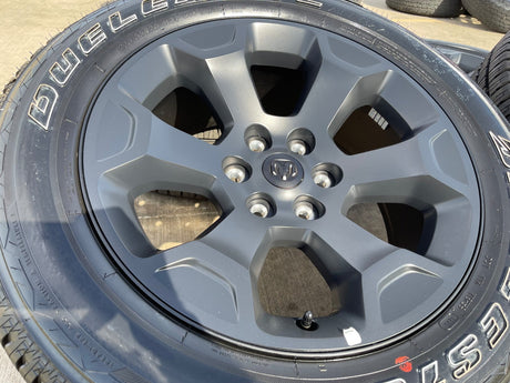 20" Dodge Ram 1500 OEM Laramie Black 2680 wheels rims tires 2024 2025 2026 NEW Texas Truck Tire