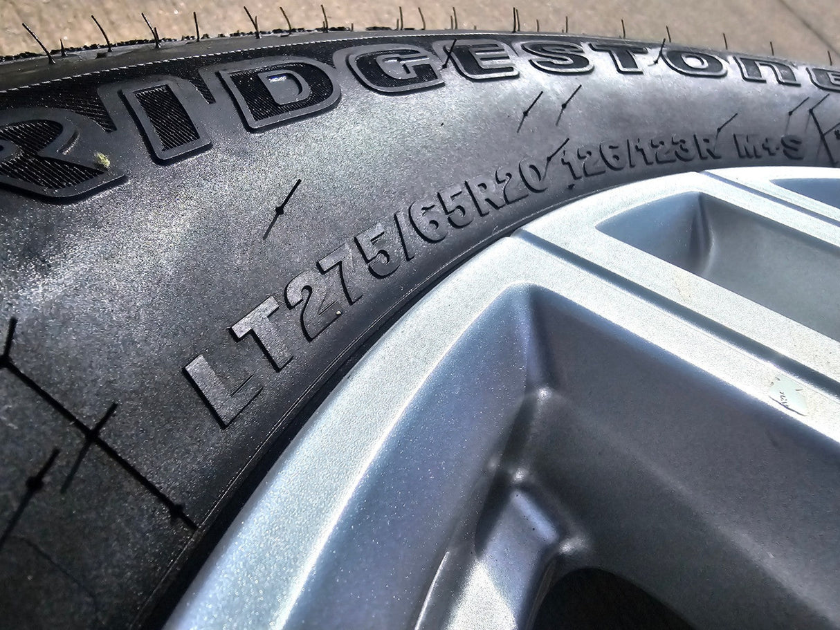 20" GMC Sierra AT4 2500 3500 OEM wheels rims 5950 Silverado BRIDGESTONE DUELER Texas Truck Tire
