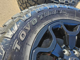 18" Dodge Ram 1500 TRX RHO Black OEM 66002 wheels rims TOYO A/T3 35" Texas Truck Tire