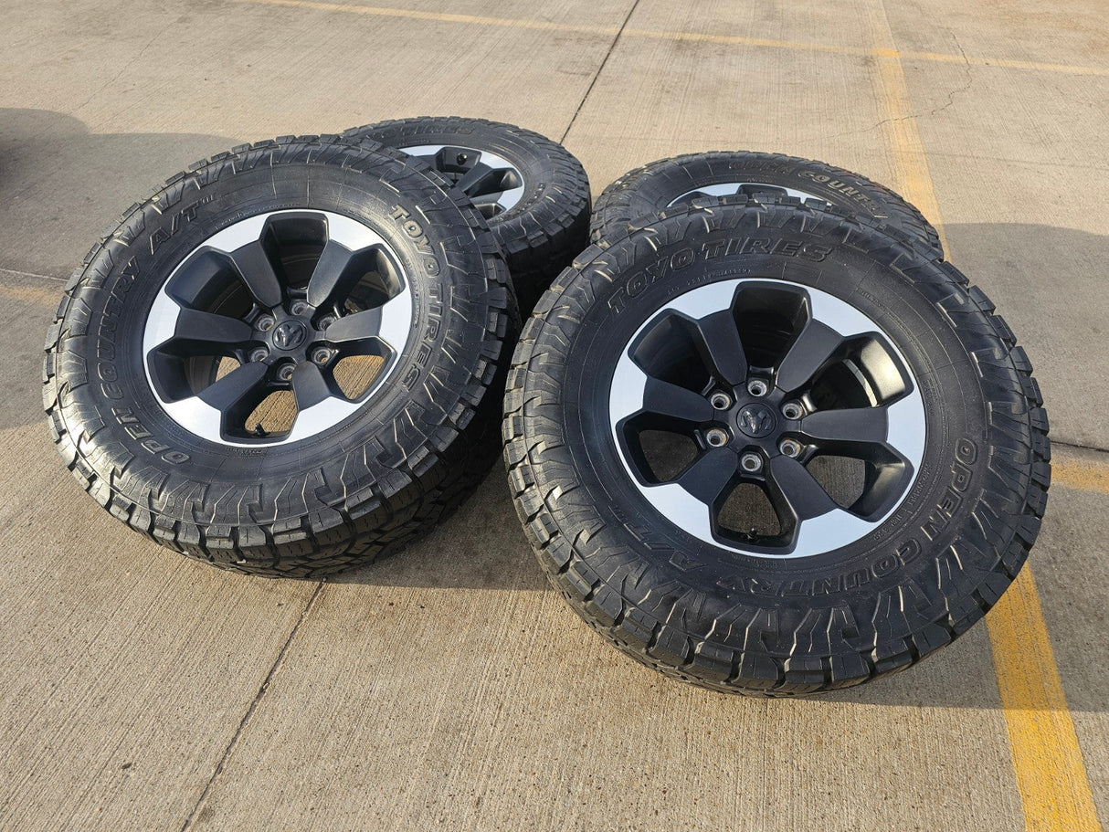 18" Dodge Ram 1500 Rebel Black OEM 2671 wheels rims TOYO A/T3 35" Texas Truck Tire