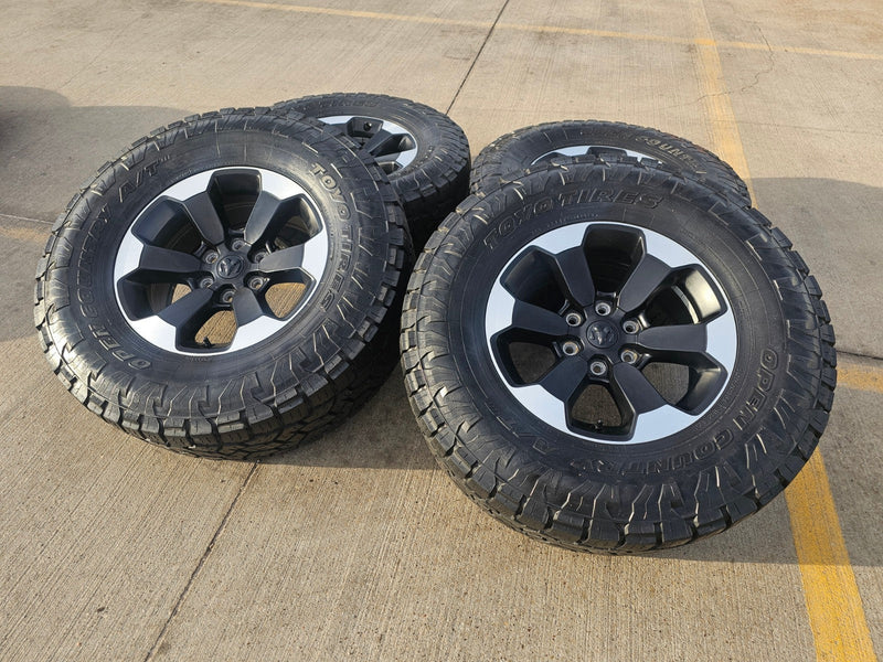 18" Dodge Ram 1500 Rebel Black OEM 2671 wheels rims TOYO A/T3 35" Texas Truck Tire