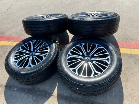 20" Nissan Titan PRO-4X Armada OEM wheels rims tires black 2023 2024 2025 2026 Texas Truck Tire