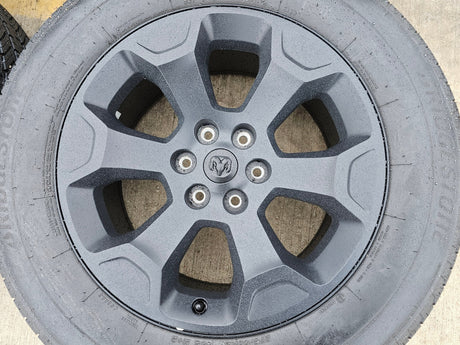 20" Dodge Ram 1500 OEM Laramie Black 2680 wheels rims 2024 2025 2026 BRIDGESTONE Texas Truck Tire