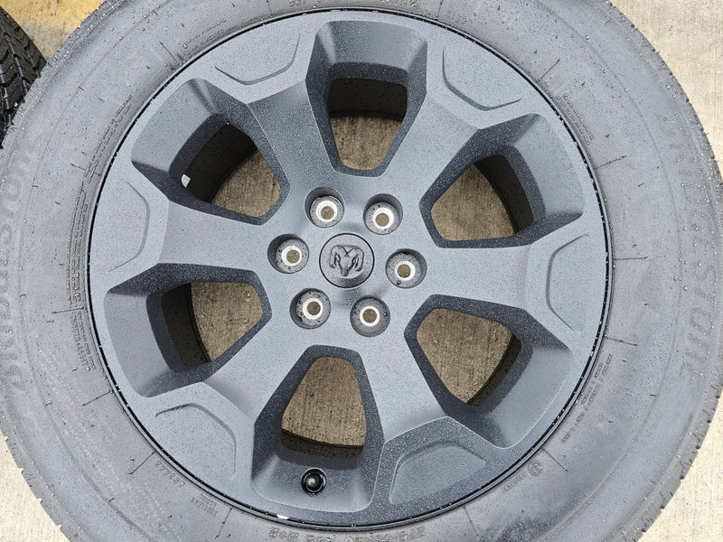 20" Dodge Ram 1500 OEM Laramie Black 2680 wheels rims 2024 2025 2026 BRIDGESTONE Texas Truck Tire