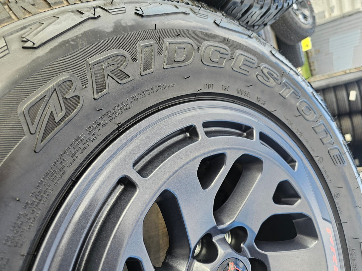 17" Nissan Frontier X-PRO OEM Desert Runner wheels rims tires DUELER A/T Texas Truck Tire