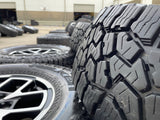 17" Jeep Wrangler Rubicon OEM 95730 9327 wheels rims Gladiator FALKEN A/T 33" Texas Truck Tire