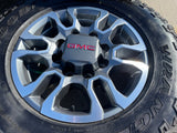 18" GMC Sierra AT4X Chevy Silverado 2500 3500 OEM 5949 wheels rims GOODYEAR A/T Texas Truck Tire